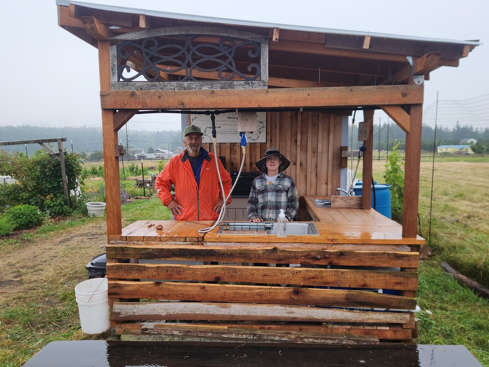 Gayle and Milly, garden managers, at wash station